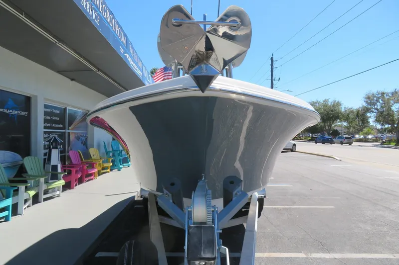 Slide: The Image of 2021 Key West 239 FS boat on trailer outside dealership. - 6