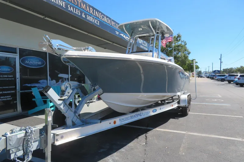 Slide: The Image of 2021 Key West 239 FS boat on trailer at Suncoast Marine Group dealership. - 7