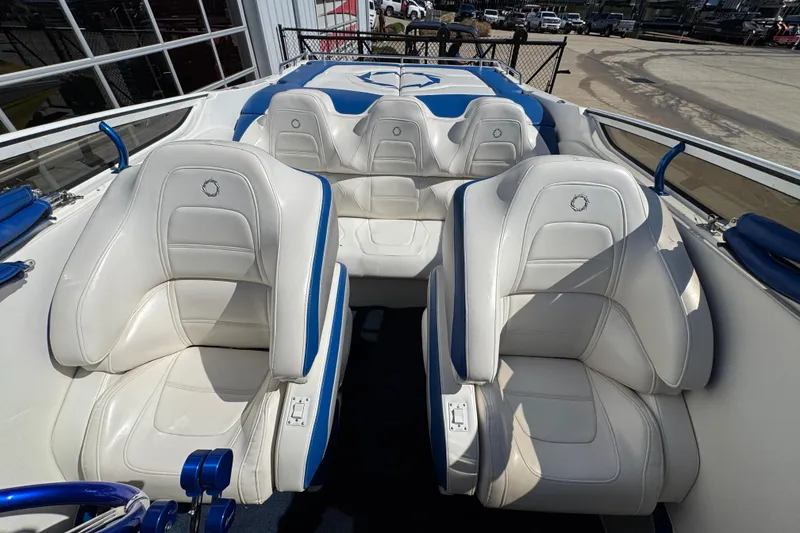 Slide: The Image of 2008 Fountain 35 Lightning boat interior with white and blue seating. - 15