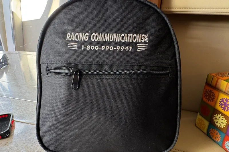 Slide: The Image of Black Racing Communications bag on a 2008 Fountain 35 Lightning boat. - 22