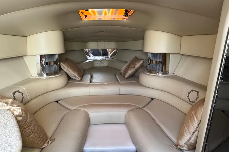 Slide: The Image of Luxurious interior of a 2008 Fountain 35 Lightning boat with plush seating and ambient lighting. - 23