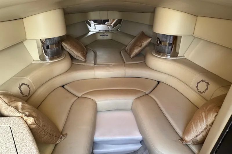 Slide: The Image of Luxurious interior of a 2008 Fountain 35 Lightning boat with plush seating and cushions. - 24