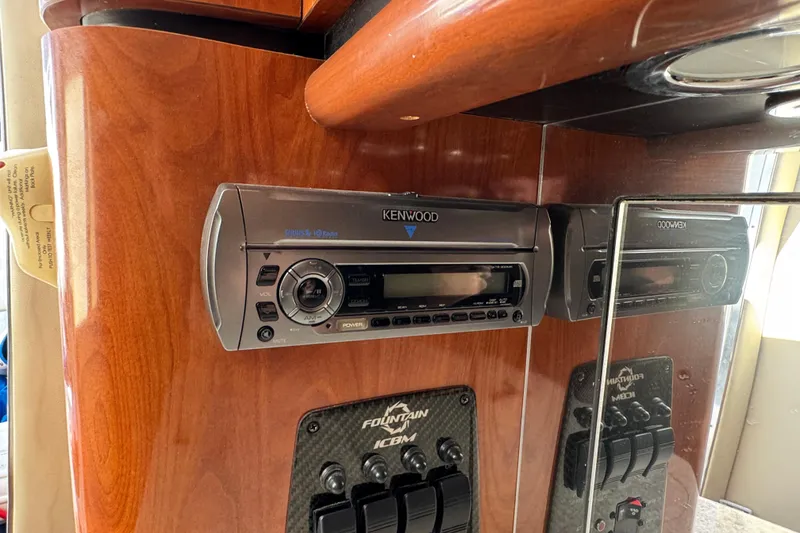 Slide: The Image of Kenwood stereo system in 2008 Fountain 35 Lightning boat interior. - 29