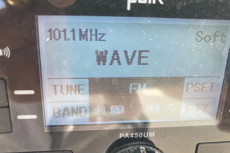 Slide: The Image of Radio display showing 101.1 MHz FM station, "WAVE," on a Tarpon 326 model. - 13