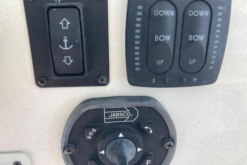 Slide: The Image of Control panel of a 2016 Tarpon 326 boat with Jabsco switch. - 14