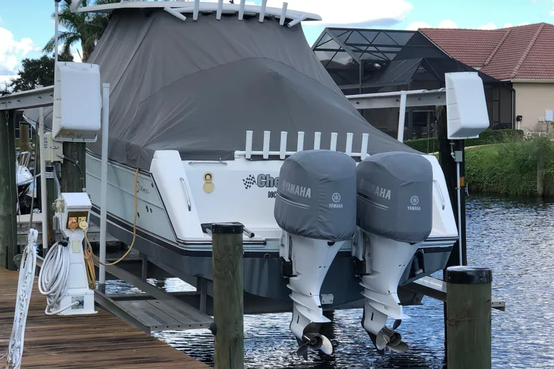 Slide: The Image of 2016 Stamas TARPON 326 boat with Yamaha engines docked by waterfront. - 23