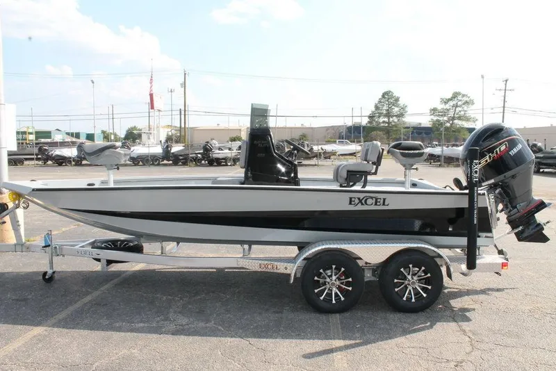 Slide: The Image of 2026 Excel Bay Pro Elite 203 boat on trailer, side view, outdoors. - 5