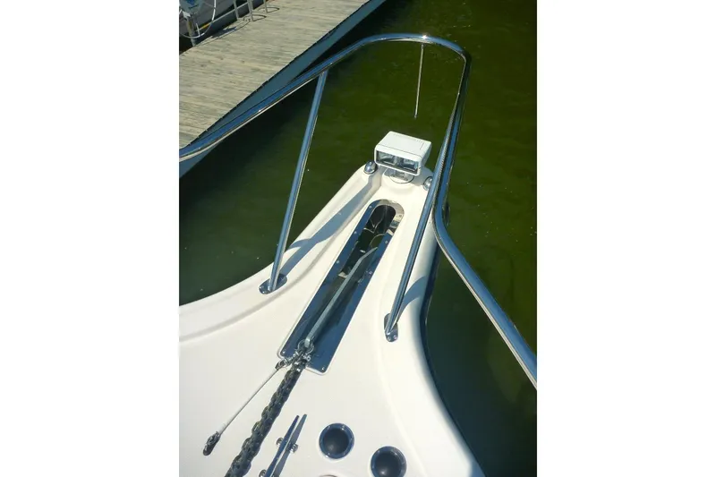 Slide: The Image of Bow view of 2006 Tiara 44' Sovran yacht with anchor chain and railing. - 15