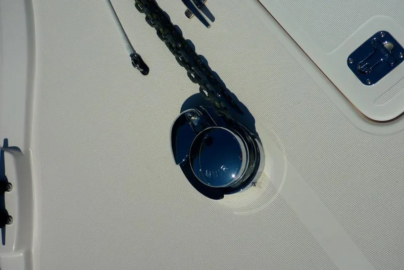 Slide: The Image of Anchor chain and deck fittings on a 2006 Tiara 44' Sovran yacht. - 16