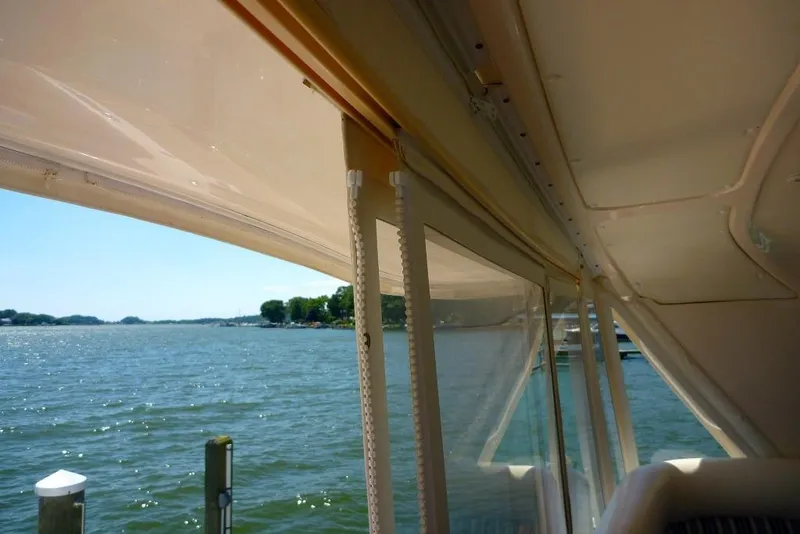 Slide: The Image of 2006 Tiara 44' Sovran yacht interior with scenic water view. - 4