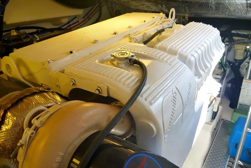 Slide: The Image of Engine compartment of a 2006 Tiara 44' Sovran yacht, showcasing mechanical components. - 41