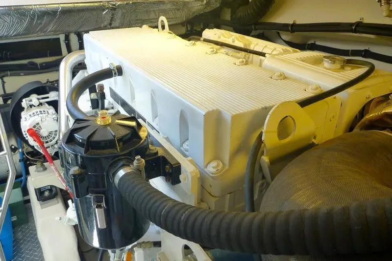 Slide: The Image of Engine room of 2006 Tiara 44' Sovran yacht, showcasing mechanical components. - 42