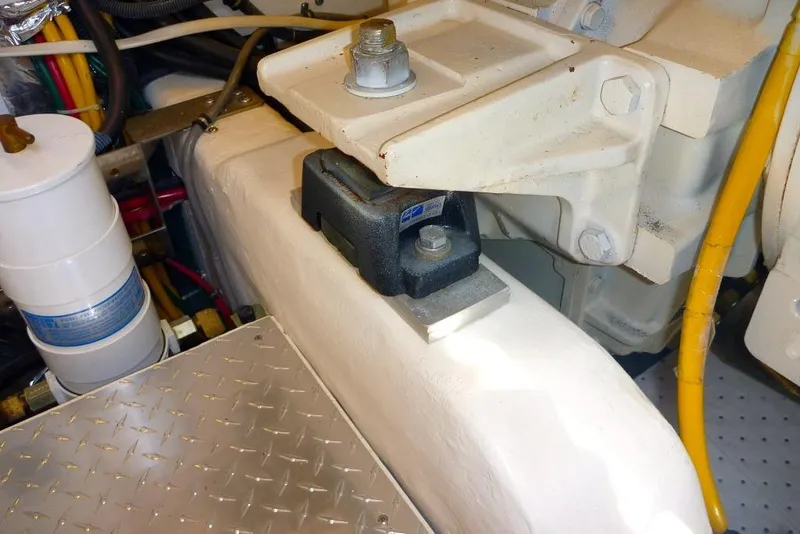 Slide: The Image of Engine compartment of 2006 Tiara 44' Sovran with visible components and wiring. - 43