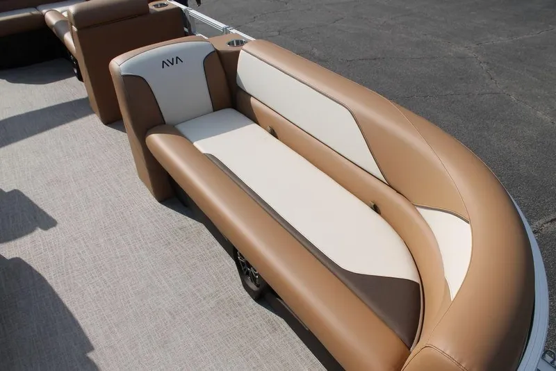 Slide: The Image of 2026 Avalon Venture Cruise Rear Bench 23 boat interior with steering console and seating. - 12