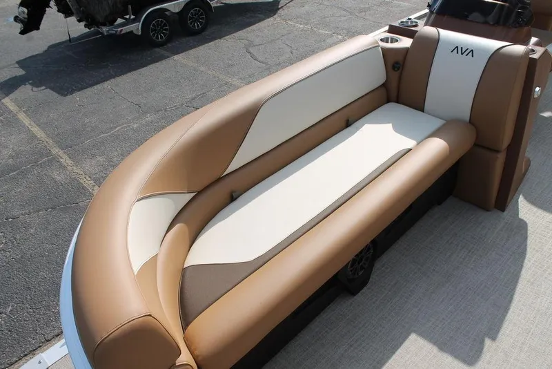Slide: The Image of 2026 Avalon Venture Cruise Rear Bench 23 interior with storage and cup holders. - 8