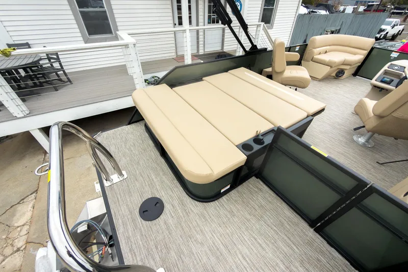 Slide: The Image of 2026 Godfrey Sweetwater Xperience 20' pontoon with beige flip lounge seating. - 16