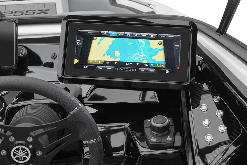 Slide: The Image of Manufacturer Provided Image: 2026 Yamaha Boats 255XE dashboard with touchscreen navigation and control panel. - 13