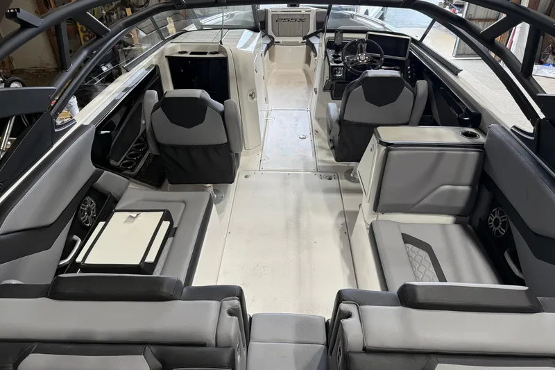 Slide: The Image of 2026 Yamaha Boats 255XE interior with modern seating and sleek design. - 3