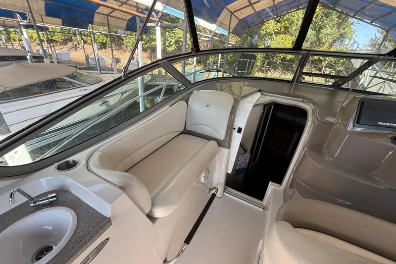 Slide: The Image of Interior of 2002 Four Winns 328 Vista boat with seating and sink. - 19