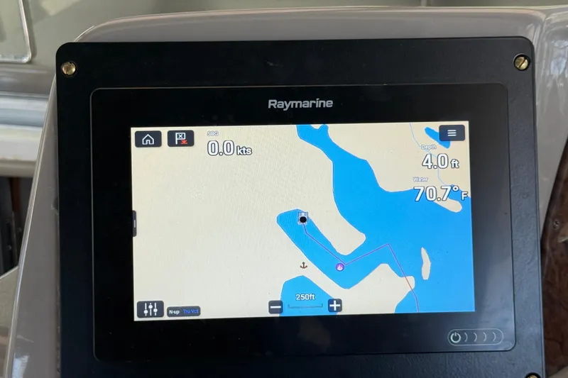 Slide: The Image of Raymarine navigation display on 2002 Four Winns 328 Vista boat, showing map and data. - 29