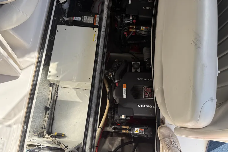 Slide: The Image of Engine compartment of a 2002 Four Winns 328 Vista boat with Volvo Penta engines. - 53