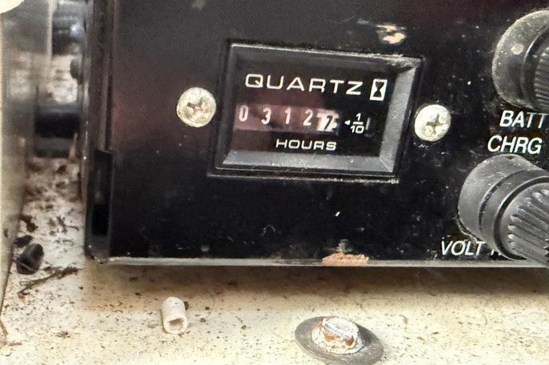 Slide: The Image of Hour meter showing 3127 hours on 2002 Four Winns 328 Vista boat. - 59