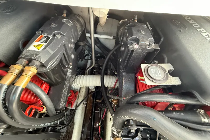Slide: The Image of Engine compartment of 2002 Four Winns 328 Vista boat with Volvo Penta components. - 61
