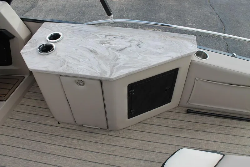 Slide: The Image of 2026 Avalon Catalina Cruise boat interior with marble countertop and cup holders. - 11