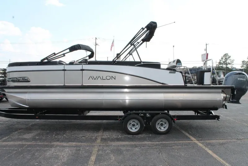Slide: The Image of 2026 Avalon Catalina Cruise 23' pontoon boat on trailer, side view. - 4