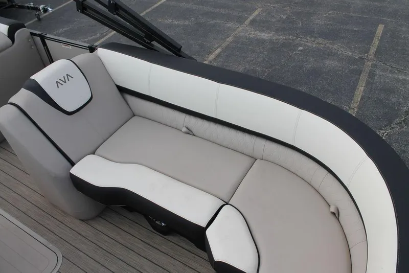 Slide: The Image of 2026 Avalon Catalina Cruise 23' boat interior with plush seating and modern design. - 5