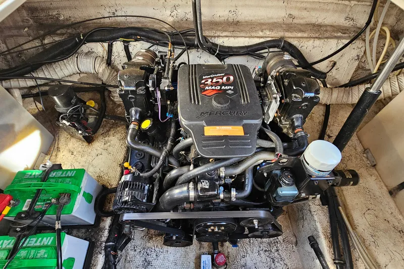 Slide: The Image of Engine compartment of 2004 Rinker 270 Fiesta Vee with MerCruiser 350 MAG MPI engine. - 26