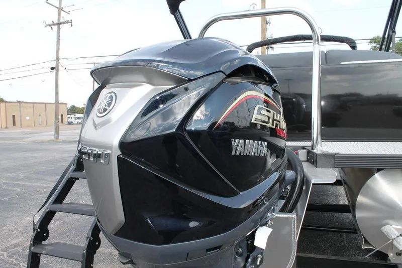 Slide: The Image of 2026 Avalon LSZ ELITE - 23 pontoon boat with Yamaha outboard motor, rear view. - 3