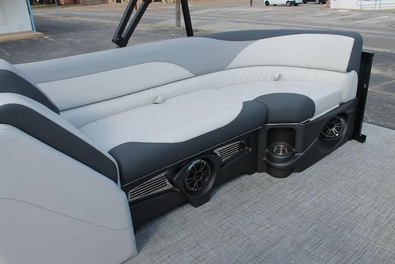Slide: The Image of 2026 Avalon LSZ ELITE - 23 boat interior with stylish seating and built-in speakers. - 8