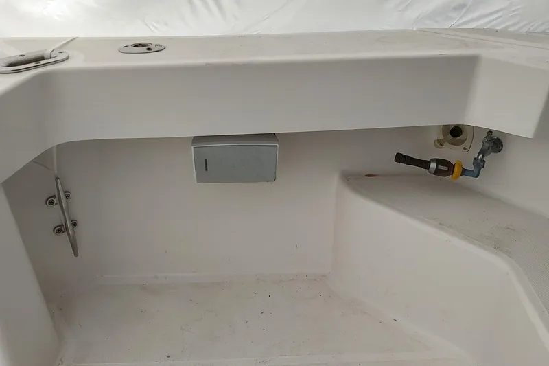Slide: The Image of 2003 Mainship 34 PILOT boat interior detail with storage and fittings. - 60