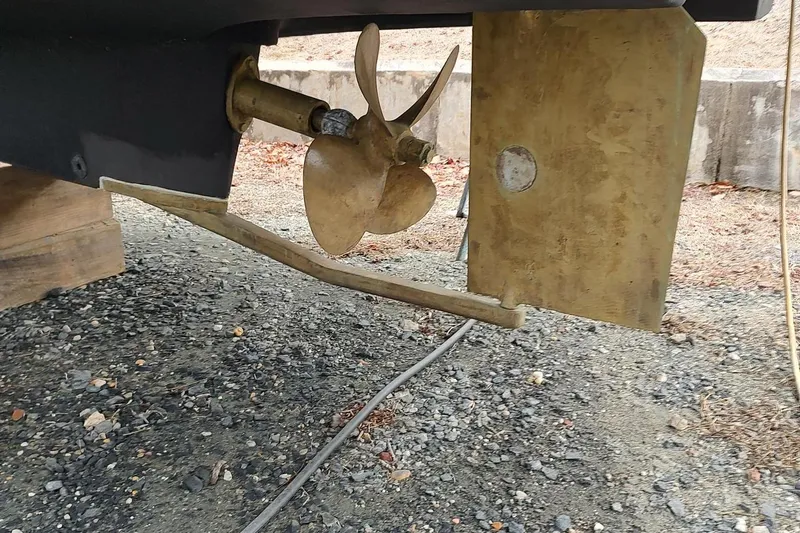 Slide: The Image of Propeller and rudder of 2003 Mainship 34 PILOT boat on dry land. - 71