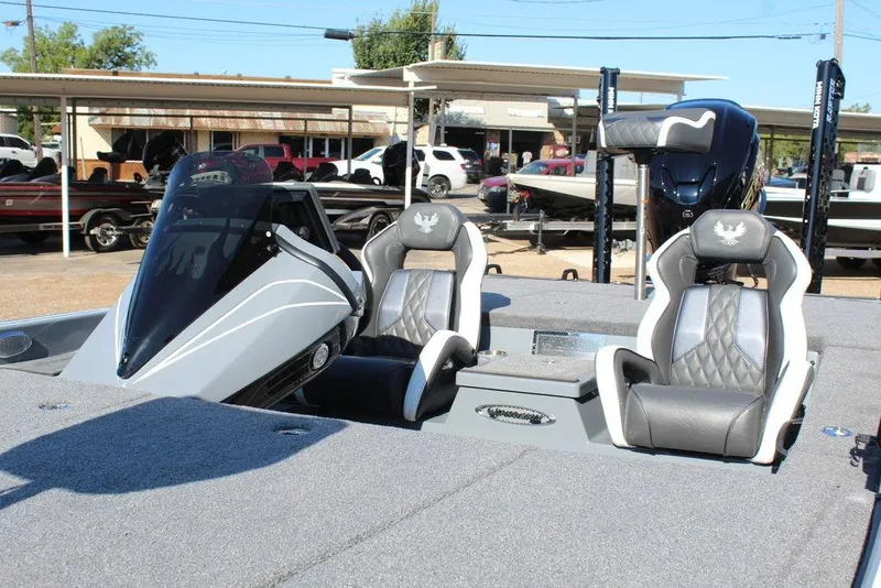 Slide: The Image of 2026 Phoenix 921 ELITE boat with sleek design and luxurious seating. - 14