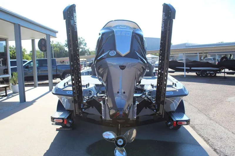 Slide: The Image of 2026 Phoenix 921 ELITE boat, rear view with motor and dual power poles. - 6