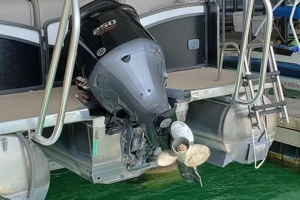 Slide: The Image of 2014 Premier Yachts 250 S-Series RF boat engine and propeller in marina. - 4