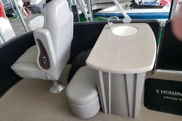 Slide: The Image of Interior of 2014 Premier Yachts 250 S-Series RF with seating and sink. - 6