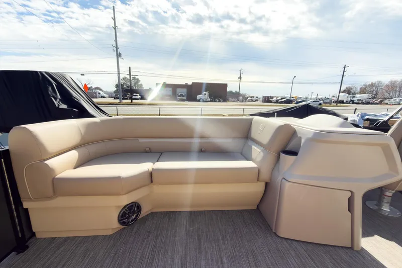 Slide: The Image of Luxurious seating on 2026 Godfrey Sweetwater Xperience 22' Split Bench Pontoon under sunny skies. - 11