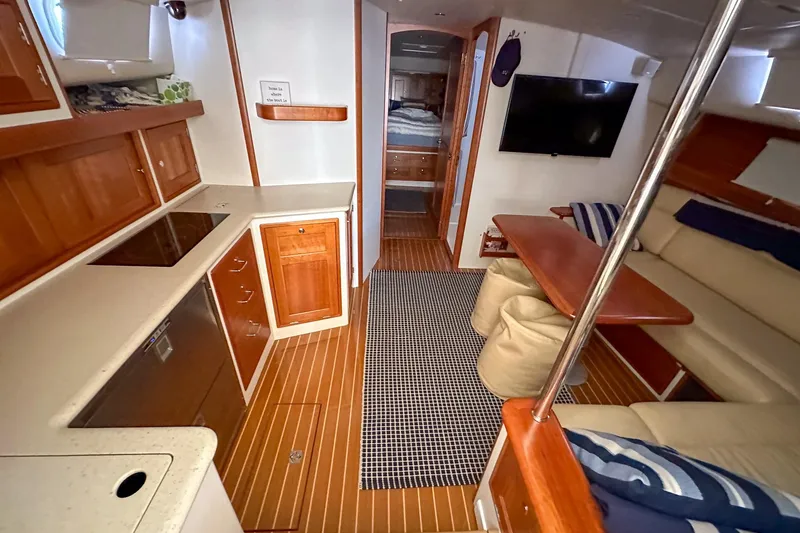 Slide: The Image of Luxurious interior of 2017 MJM 50z yacht with kitchen and seating area. - 28