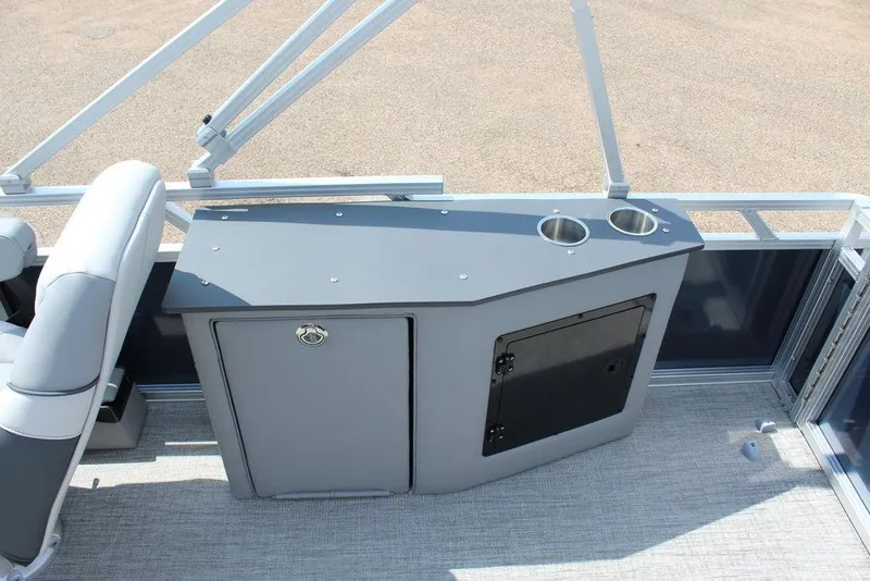 Slide: The Image of 2026 Avalon LSZ Cruiser Rear Bench 23 with sleek gray console and cup holders. - 10