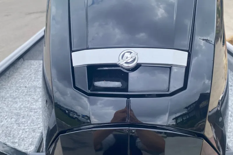 Slide: The Image of Close-up of a 2025 Tracker Pro Team 175 Crappie Edition boat engine. - 10