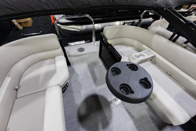 Slide: The Image of 2026 Godfrey Sweetwater Xperience 20' Split Bench Pontoon interior with seating and cup holders. - 39