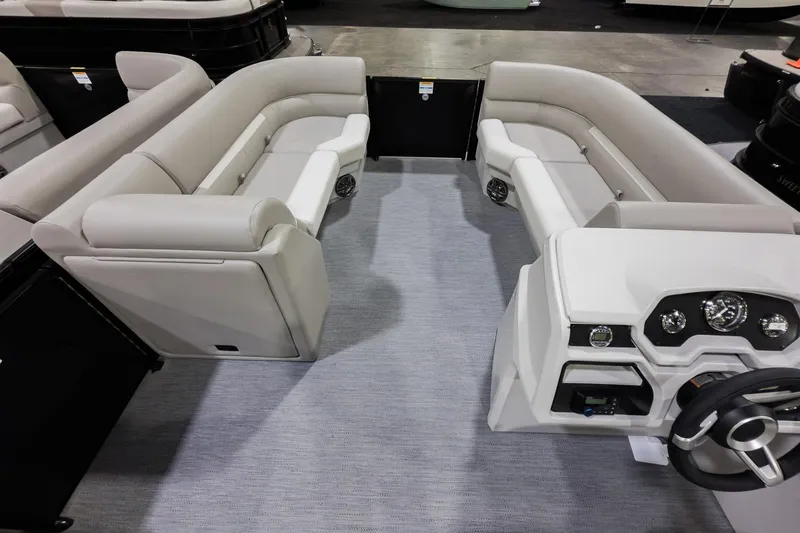 Slide: The Image of 2026 Godfrey Sweetwater Xperience 20' Split Bench Pontoon interior with plush seating and modern dashboard. - 40