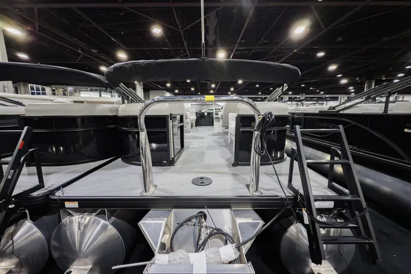 Slide: The Image of 2026 Godfrey Sweetwater Xperience 20' Split Bench Pontoon, interior view at a boat show. - 43