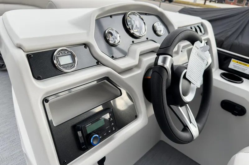 Slide: The Image of Steering console of 2026 Godfrey Sweetwater Xperience 20' Split Bench Pontoon. - 8
