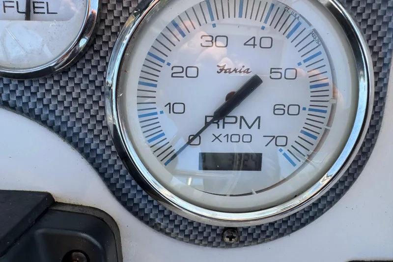 Slide: The Image of Close-up of a Faria RPM gauge on a 2012 Carolina Skiff 238 DLV boat. - 19