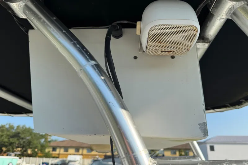 Slide: The Image of 2012 Carolina Skiff 238 DLV boat speaker and metal frame detail. - 23