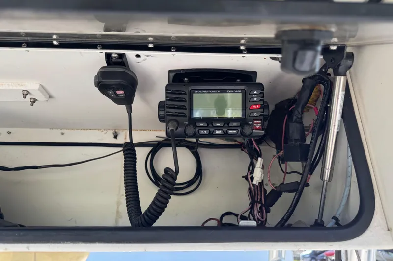 Slide: The Image of 2012 Carolina Skiff 238 DLV boat radio system with microphone and wiring. - 9